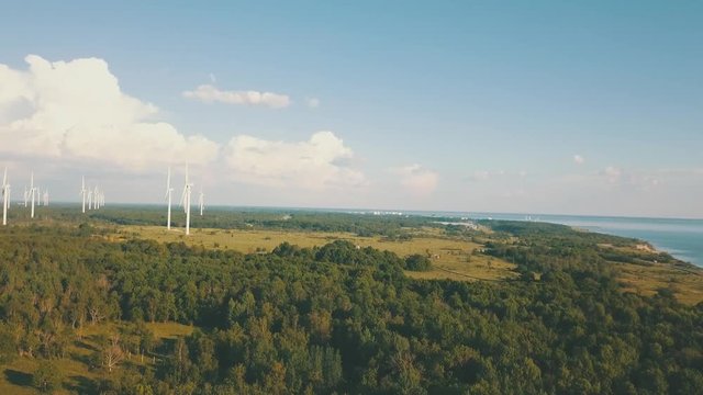 Windmills in summer filde in Estonia, drone footage