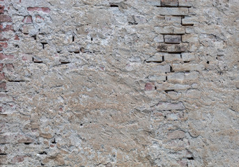 Grayish Old Weathered Concrete Wall Texture With Some Bricks Visible