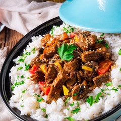 Tajin beef stew with rice paprika and sesame seeds