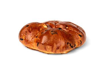 Bun with raisins isolated on white background.