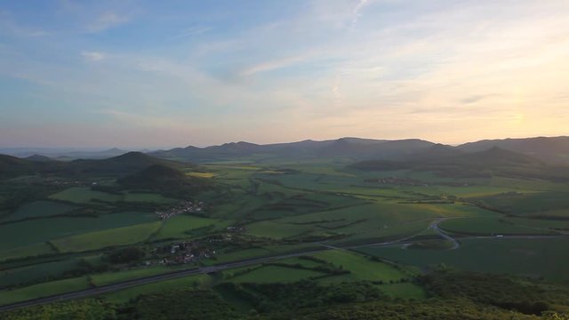 View from Lovos Hill. Sunset  in Central Bohemian Highlands, Czech Republic. Central Bohemian Uplands  is a mountain range located in northern Bohemia. The range is about 80 km long.
