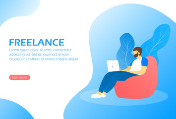 Freelance. Remote work. Man sits on a chair bag and works at a laptop.