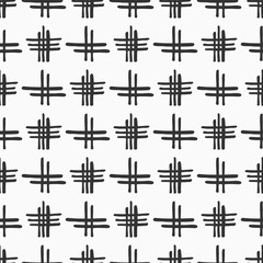 Abstract seamless pattern of hand drawn intersecting stripes. Monochrome vector background.