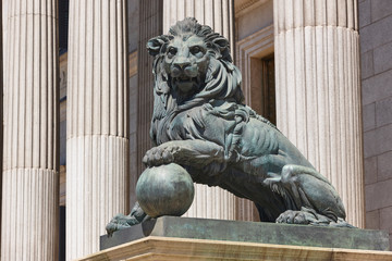 Parliament facade columns and lion in Madrid capital, Spain. Congreso