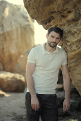 Young stylish man outdoor photo near the sea