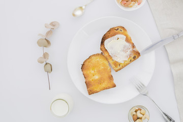 Breakfast with slices of bread and butter