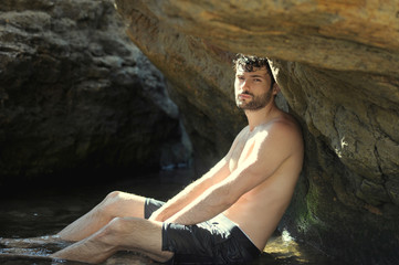 Young stylish man outdoor portrait near the sea