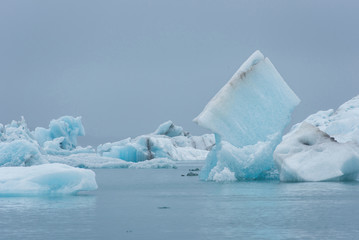 Fototapeta na wymiar Melting floating icebergs in Jokulsarlon, Iceland