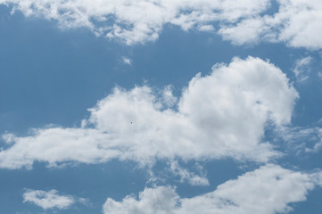 fluffy clouds on a sunny day