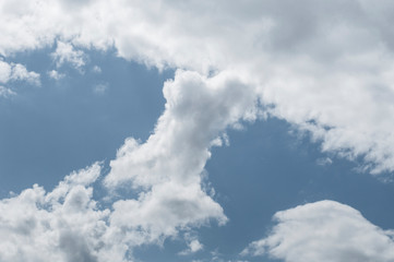 fluffy clouds on a sunny day
