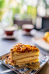 Piece of cake on wooden table
