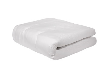 Rolled or folded white duvet or bedspread, close up photo