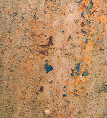 Rusty metal surface with stains