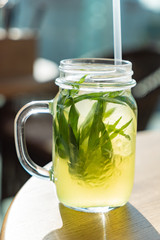 summer lemonade with tarragon and lemon