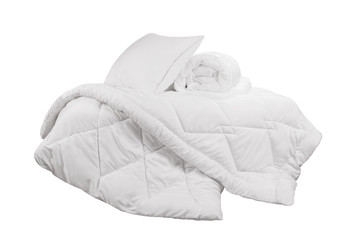 Fototapeta na wymiar White duvet or coverlet with white pillows isolated