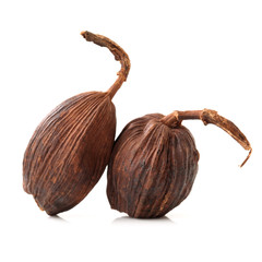 Black cardamom on a white background 