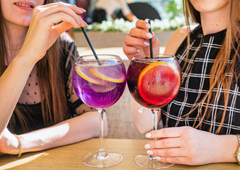 women drinking summer fresh cocktail