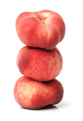 chinese flat peaches on white background 