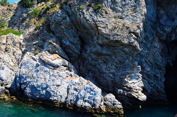 amazing clear waters of the Aegean Sea and the rocks