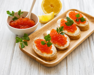 Red caviar and sandwiches