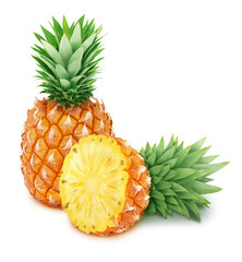 Whole and halved pineapples isolated on white background.