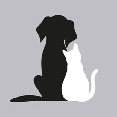 black dog and white cat on a gray background