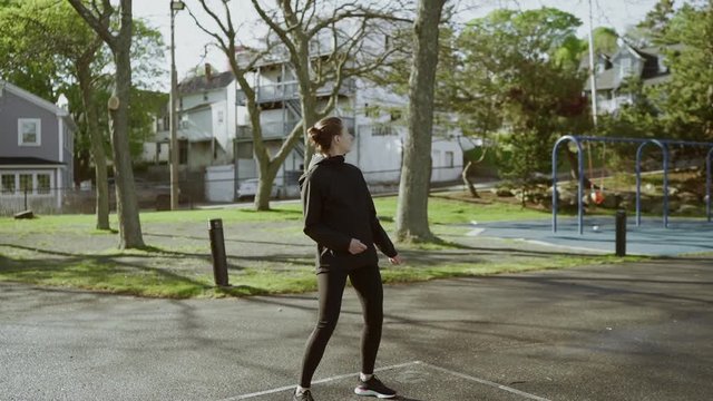 Young woman smiling and having fun after training. Female dancing.