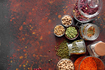 Assortment of legumes on color background
