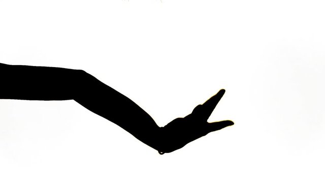 female hands dancing back light for masks