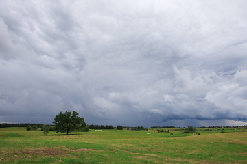 Summer landscape with stormy sky