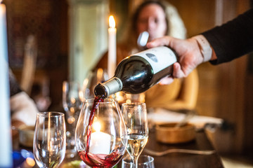 Red wine being served