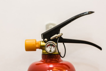 Fire extinguisher isolated closeup view on white background