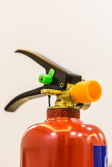 Fire extinguisher isolated closeup view on white background