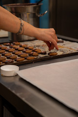 Detail of tea pasta, with chocolate and decoration of colored sugar hearts.