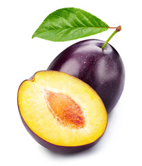 Plums half with leaves isolated