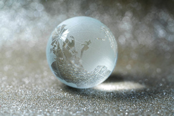 Close up of glass globe in beautiful bokeh background - Africa & Europe