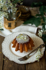Rum cake with blooming flowers