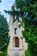 Fototapeta na wymiar French church amongst trees