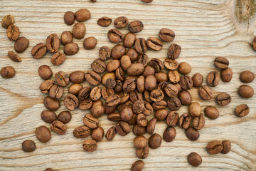 Roasted coffee beans on the wooden table