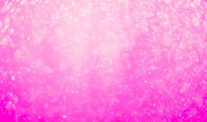 Bokeh background and bubbles reflecting pastel pink