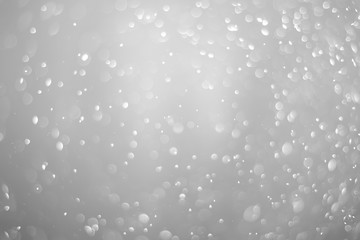 Bokeh background and bubbles reflecting black and white light