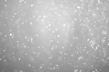 Bokeh background and bubbles reflecting black and white light