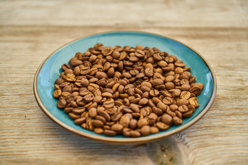 Roasted coffee beans on plate