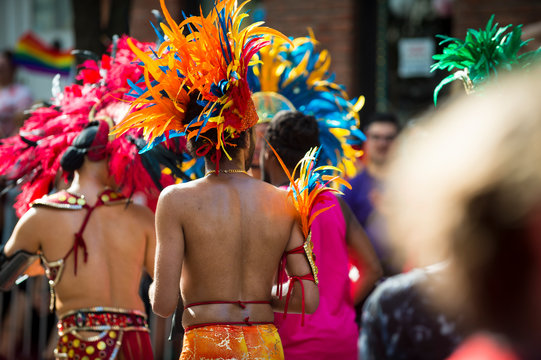 Flamboyantly colorful scene at a gay pride parade in the city