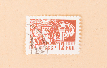 CCCP - CIRCA 1966: A stamp printed in the CCCP shows a working man, circa 1966