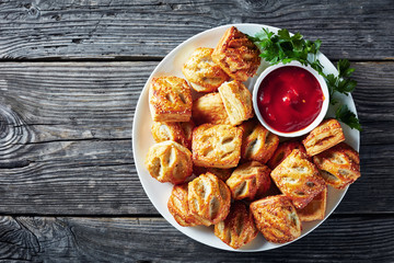 Puff pastry rolls with minced chicken meat