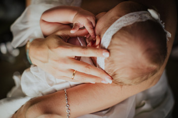 baby and bride in an lovely moment