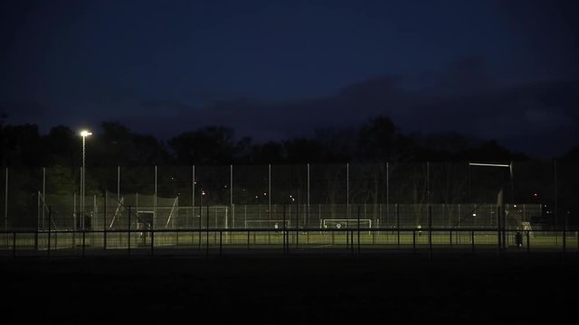 Football Stadium in Park Panorama at Dusk