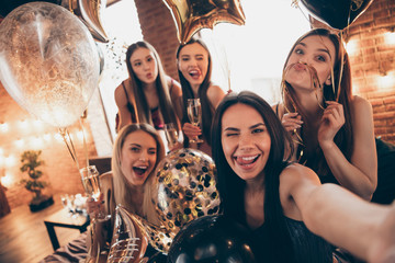 Close up photo beautiful five she her chic ladies little drunk clink wineglasses beverage tongue out mouth funny make take selfies speak talk tell skype share news festive night evening room indoors - obrazy, fototapety, plakaty