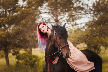 Obraz premium Girl on a black horse
